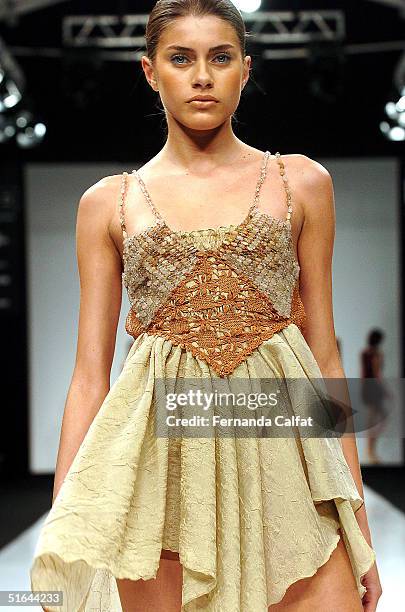 Model Larissa Castro wears a garment by Brazilian designer Marcia Ganem during the 2005 Spring/Summer collection Fashion Rio Summer 2005, in Rio de...