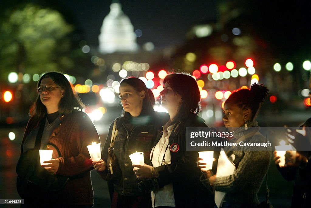 Candlelight Vigil Held On Eve Of Election