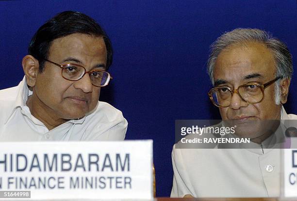 Indian Finance Minister P. Chidambaram and Indian state of West Bengal's Finance Minister and chairman of the Empowered Committee on the Value-Added...