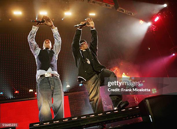 Rappers Jay-Z and Memphis Bleek perform on the "Best of Both Worlds" tour, November 1, 2004 at Madison Square Garden in New York City. The tour was...