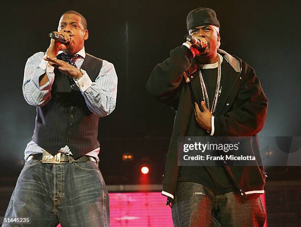 Rappers Jay-Z and Memphis Bleek perform on the "Best of Both Worlds" tour, November 1, 2004 at Madison Square Garden in New York City. The tour was...