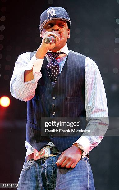 Rapper Jay-Z performs on the "Best of Both Worlds" tour, November 1, 2004 at Madison Square Garden in New York City. The tour was originally a...