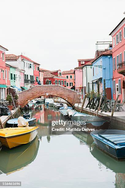 brightly painted homes on the island of burano, italy - venizia stock pictures, royalty-free photos & images