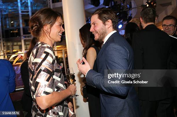 Jessica Schwarz, formerly girlfriend of Daniel Bruehl, Daniel Bruehl and his girlfriend Felicitas Rombold during the 'Vogue loves Breuninger' fashion...