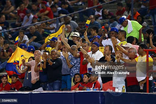 Fans of of Team Colombia cheer during Game 3 of the World Baseball Classic Qualifier against Team Panama at Rod Carew Stadium on Friday, March 18,...