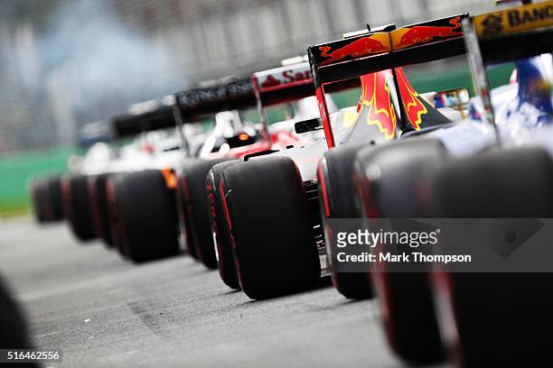 The cars wait to go out in the Pitlane during qualifying for the Australian Formula One Grand Prix at Albert Park on March 19, 2016 in Melbourne,...