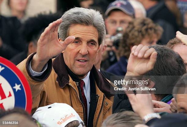 Democratic presidential candidate U.S. Senator John Kerry greets supporters at a voter registration sign-up November 2, 2004 in Lacrosse, Wisconsin....