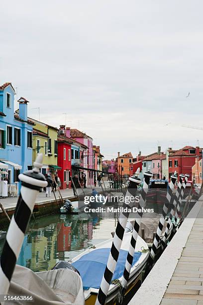 brightly painted homes on the island of burano, italy - venizia stock pictures, royalty-free photos & images