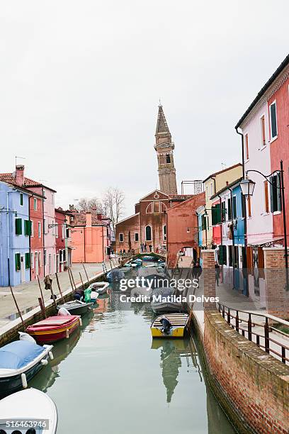 brightly painted homes on the island of burano, italy - venizia stock pictures, royalty-free photos & images