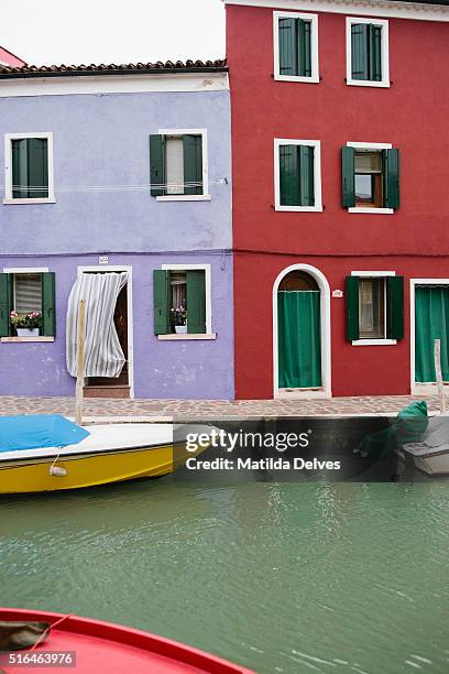 brightly painted homes on the island of burano venice, italy - venizia stock pictures, royalty-free photos & images