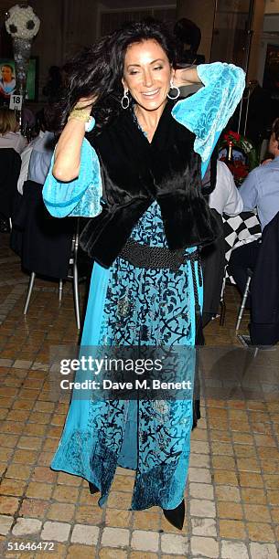 Nancy Dell'Olio attends a charity sports quiz at the Royal Exchange on November 1, 2004 in London. The evening, which included a dinner, was to help...