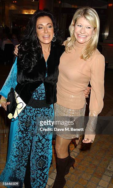 Nancy Dell'Olio and Giulia Constantini attend a charity sports quiz at the Royal Exchange on November 1, 2004 in London. The evening, which included...
