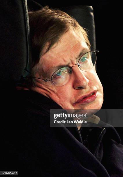 Scientist Stephen Hawking reads out names during a vigil at Trafalgar Square at which a list of names of people killed in the Iraq war is read out...