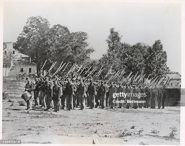Civil war scene: Detachment of Union troops with bayonettes atop rifles ready to move towards Harper's Ferry, West Virginia.