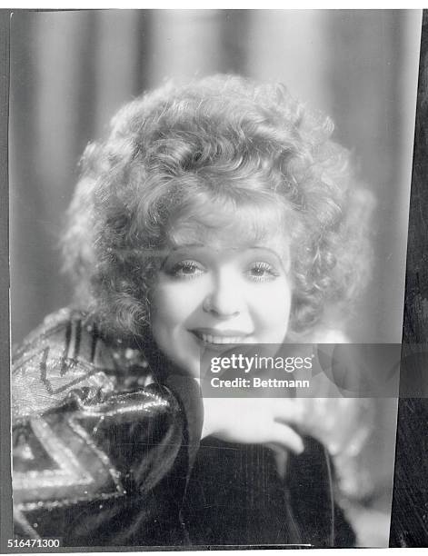 Silent movie star Clara Bow smiles.