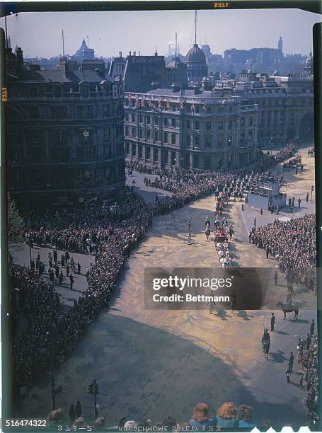 London, England: Royal silver wedding procession crossing Trafalgar Square. Admiralty arch in background.