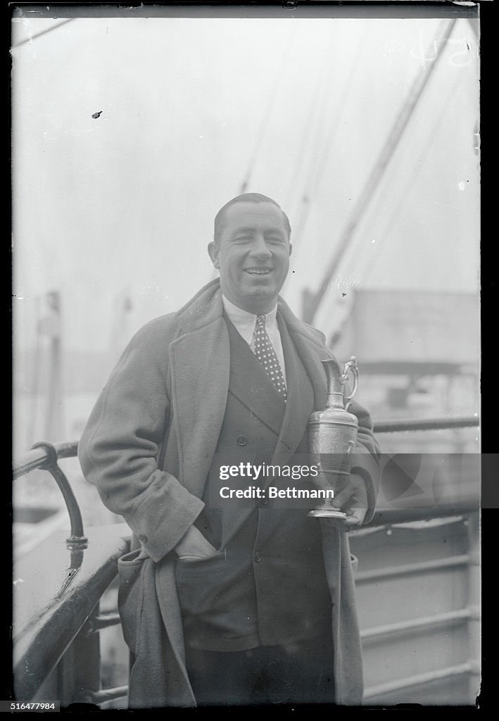 Walter Hagen Posing with Trophy
