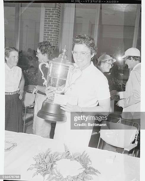 Fay Crocker with U.S. Women's Open golf trophy.