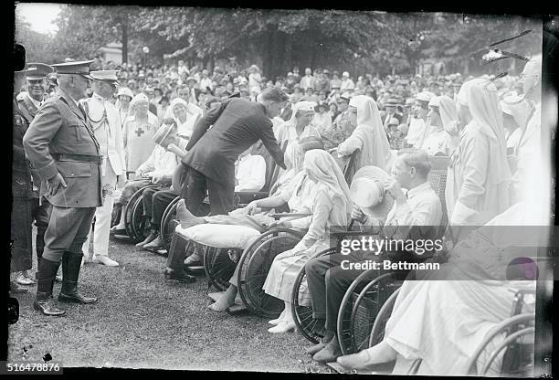 Among the many other things that Captain Lindbergh did Sunday, June 12th, was to visit the World War Veterans in the Walter Reed Hospital at...