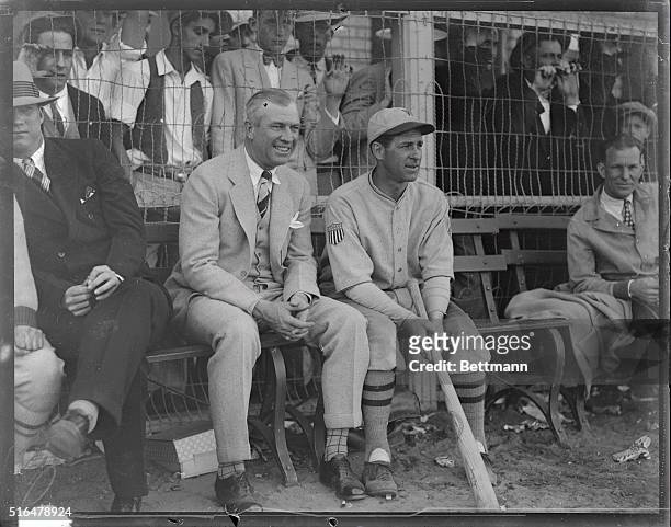 Photo shows Tris Speaker, former player for the Cleveland Indians, and now outfielder for the Washington Senators, with "Bucky" Harris , youthful...