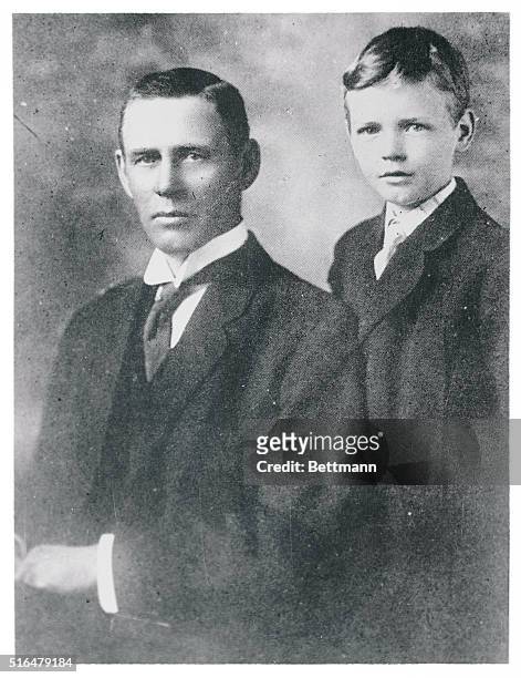 Photo shows , Charles A. Lindbergh photographed with his father, the late Congressman from Minnesota, Charles A. Lindbergh, Sr. This photo was taken...