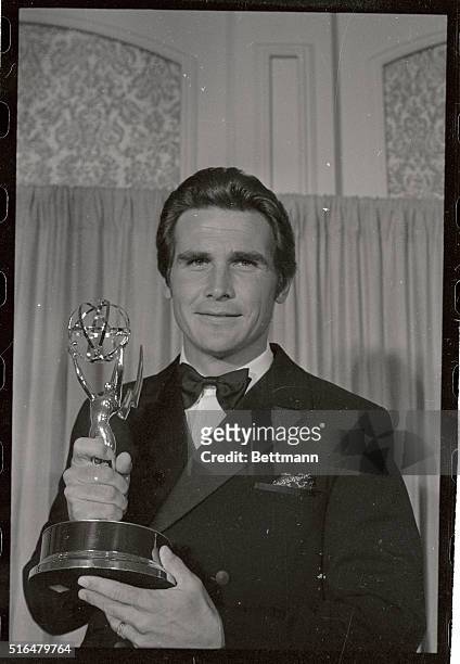 Actor James Brolin holding the Emmy for Best Actor in A Supporting role he won for "Marcus Welby, M.D.".