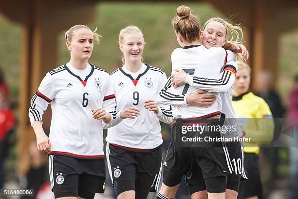 Lisa Schoeppl, Anna-Lena Stolze, Giulia Gwinn and Janina Minge of Germany celebrate after scoring during the U17 Girl's Euro Qualifier match between...