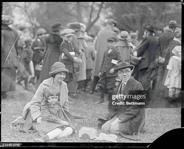 Washington, D.C.: Easter egg rolling contest on White House lawn a brilliant affair. Representative Vincent M. Brennan of Michigan, with his wife and...