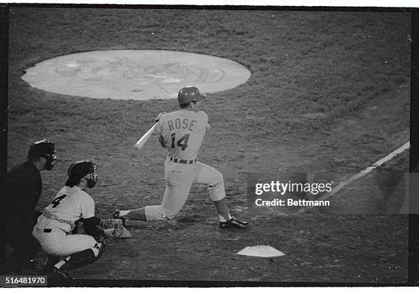 Red's short stop Dave Concepcion takes a flying leap in the air to field a ground ball hit by Braves Rico Carty in the seventh inning. Concepcion...