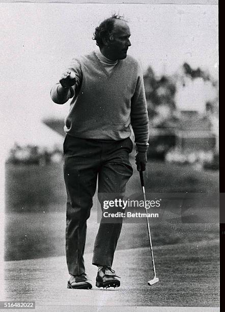 British pro Neil Coles acknowledges the applause of the spectators on the 17th hole of his first round in the British Open Golf Tournament here, July...