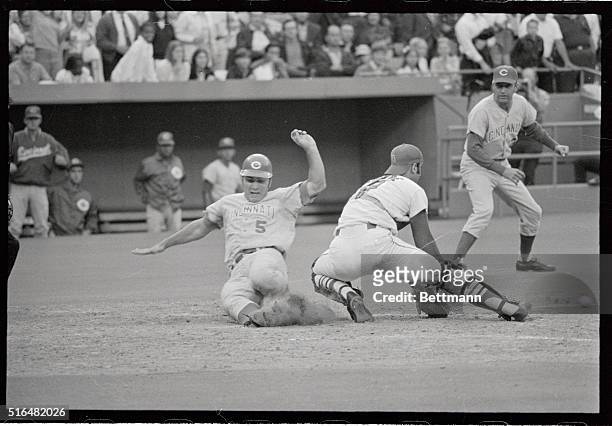 Cincinnati Reds; Johnny Bench , scores behind St. Louis Cardinals' catcher Joe Torre in the eighth inning of the first Cards-Reds game, 7/20. Bench...
