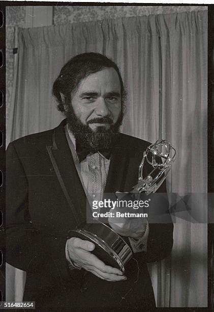 Actor Michael Constantine holding the Best Supporting Actor in a Comedy Emmy he won for "Room 222".