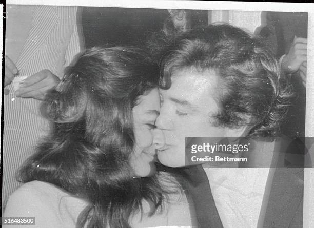 The English actor Albert Finney kisses his bride French actress Anouk Aimee after their marriage at the Kensington Register Office here, on August...