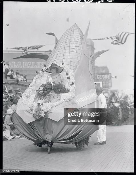 Atlantic City: At Atlantic City Beauty Pageant. Miss Thelma Blossom, pictured here in her roller chair float which won first prize in the boardwalk...