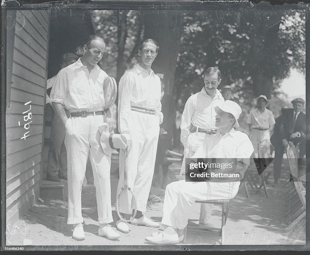 Tennis Players Conversing Together