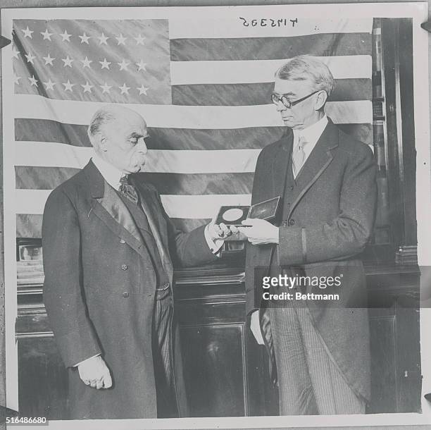 American Ambassador Presents Medal To Colonel Young-Husband. Ambassador George Harvey presenting to Sir Francis Young-Husband, the Medal of the...