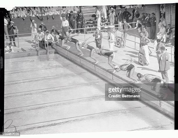 This photo shows the start of the 400 meter free style , finals in the event of the Olympiad. They are: J. Taris, of France, Lane 1, second place; T....