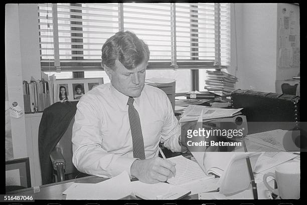 Washington: Sen. Edward Moore Kennedy works in his office on the speech he will deliver at Georgetown University. Kennedy said the speech will a...
