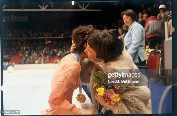 Winners of Olympics medals in the women's figure skating competition pose with their medals at presentation ceremonies 2/23, from left; Linda...