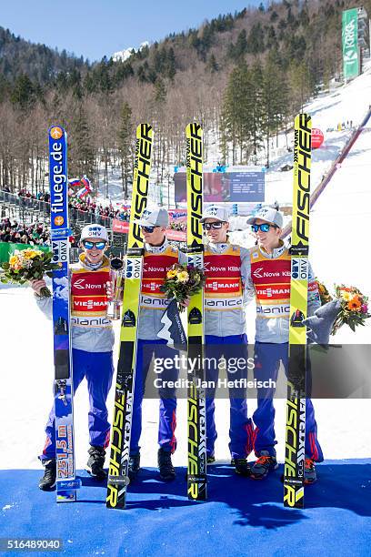 Daniel Andre Tande, Johann Andre Forfang, Keneth Gangnes and Anders Fannemel of Norway pose for a picture after winning the flying hill team...