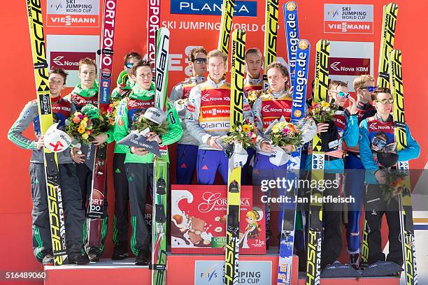 Jurij Tepes, Anze Semenic, Robert Kranjec and Peter Prevc of Slovenia, Daniel Andre Tande, Anders Fannemel, Keneth Gangnes of Norway and Johann Andre...