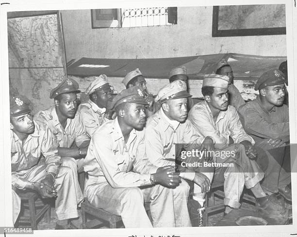 Black Pilots. Washington, DC: Unidentified group of pilots of the 332nd Fighter Group, 15th Air Force, is briefed before start of a mission in Italy...