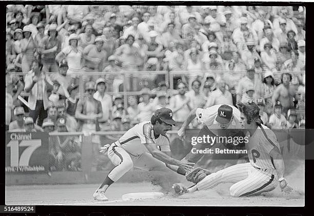 Phils' Pete Rose, right, is out at third base as he is tagged by Astors' Rafael Landestoy, Rose was trying to advance on a Bake McBride hit that...