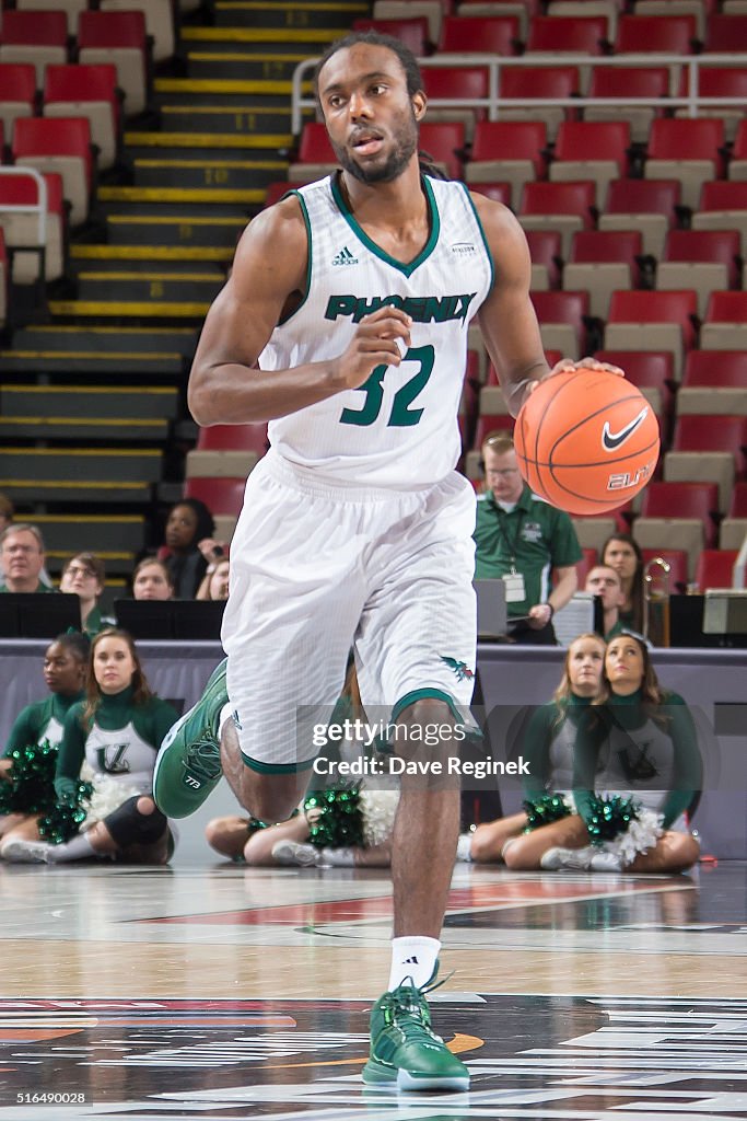 Tevin Letronball Tevin Findlay of the Green Bay Phoenix moves the ball up court... News ...