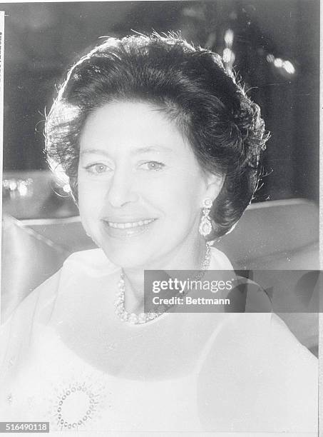 London: Princess Margaret celebrates her 50th birthday on August 21st. Photographed in Kensington Palace, she is wearing dress of white Georgette...