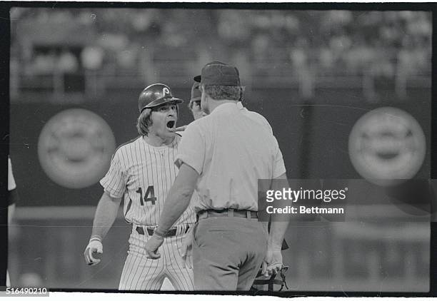 Phils' Pete Rose cannot not believe being called out for batter's interference in the seventh inning in Philadelphia 5/18. Rose was called out as he...