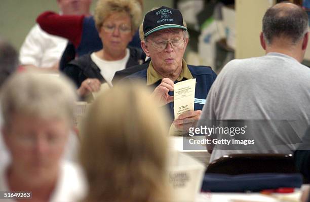 Election workers sort through ballots at the Hamilton County Board of Elections November 2, 2004 in Cincinnati, Ohio. Ohio is seen as an important...