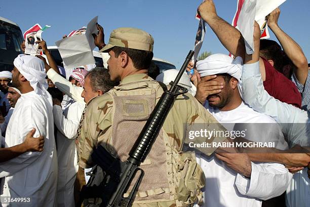 An Emirati man mourns during the funeral of Sheikh Zayed bin Sultan al-Nahayan in Abu Dhabi 03 November 2004. Nahayan, the president and founding...