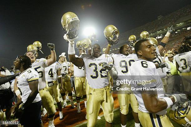 Georgia Tech Yellow Jackets including Nate Curry, Johnathan Jackson, and Pat Clark celebrate after their Atlantic Coast Conference game against the...
