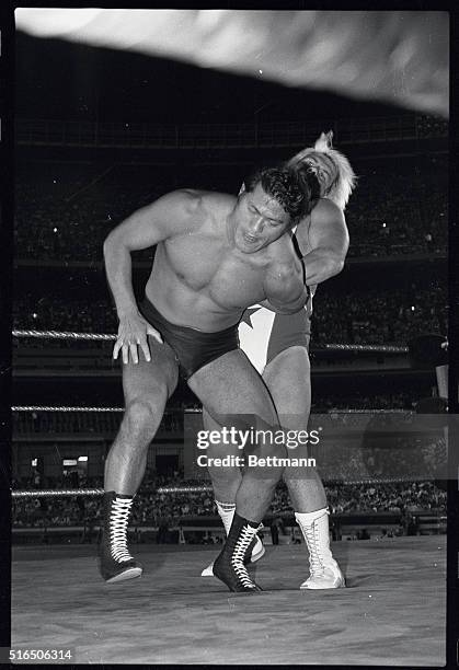 Japanese wrestler Antonio Inoki gets himself into a little bit of arm trouble at the hands of Larry "Pretty Boy" Sharpe during their match at Shea...